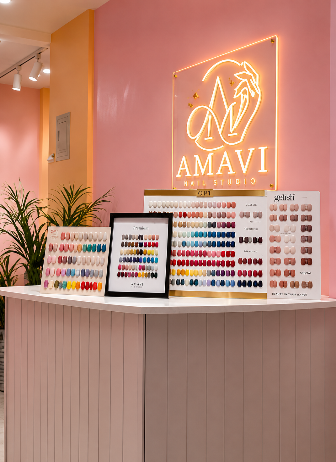 AMAVI nail polish display and illuminated studio sign